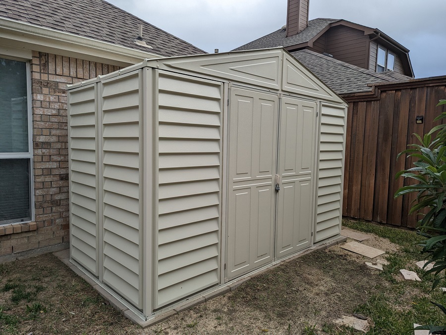 DuraMax 10 x 5 Foot WoodBridge Vinyl Storage Shed with Steel Foundation Frame
